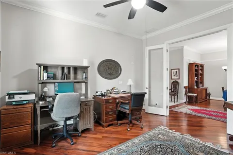 a view of a workspace with furniture