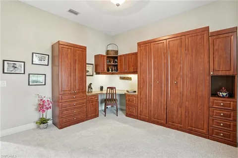 a room with furniture a washer and dryer
