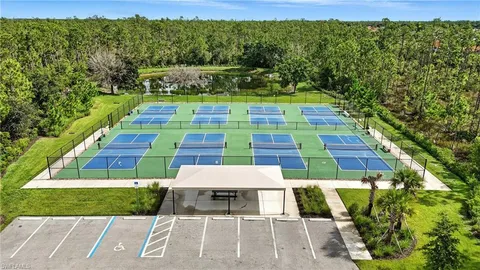 a view of a swimming pool with a garden