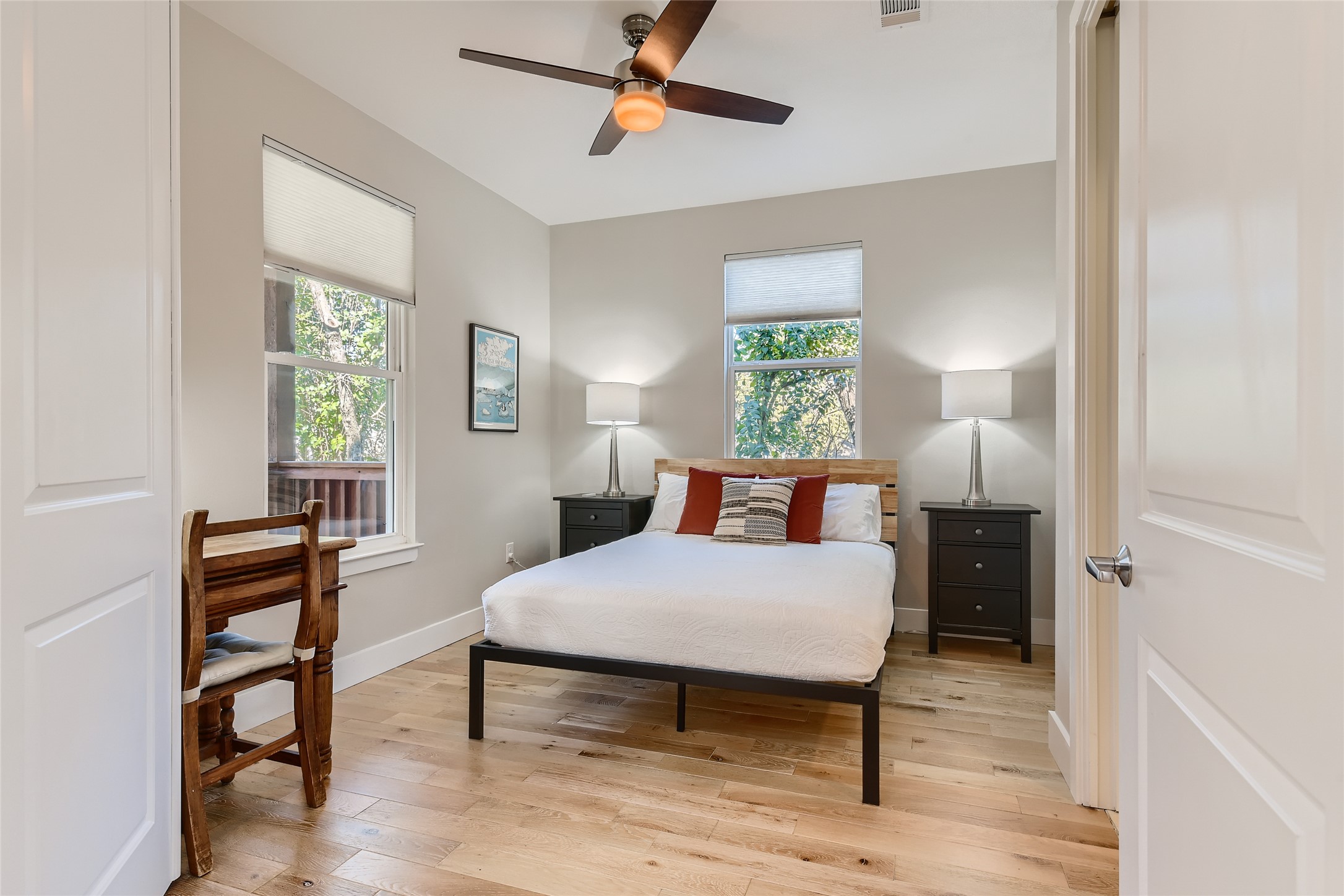 1205 Enfield Road Austin, TX 78703 - Photo 11 of 34 a bedroom with a bed and a window