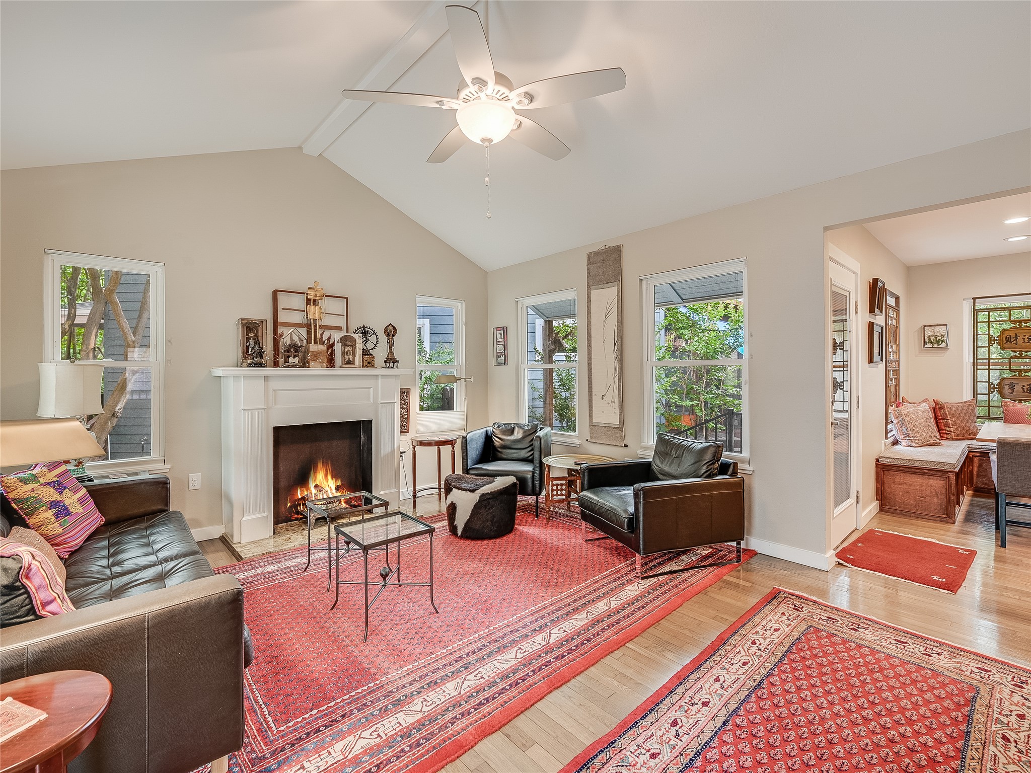 1205 Enfield Road Austin, TX 78703 - Photo 31 of 34 a living room with furniture and a fireplace