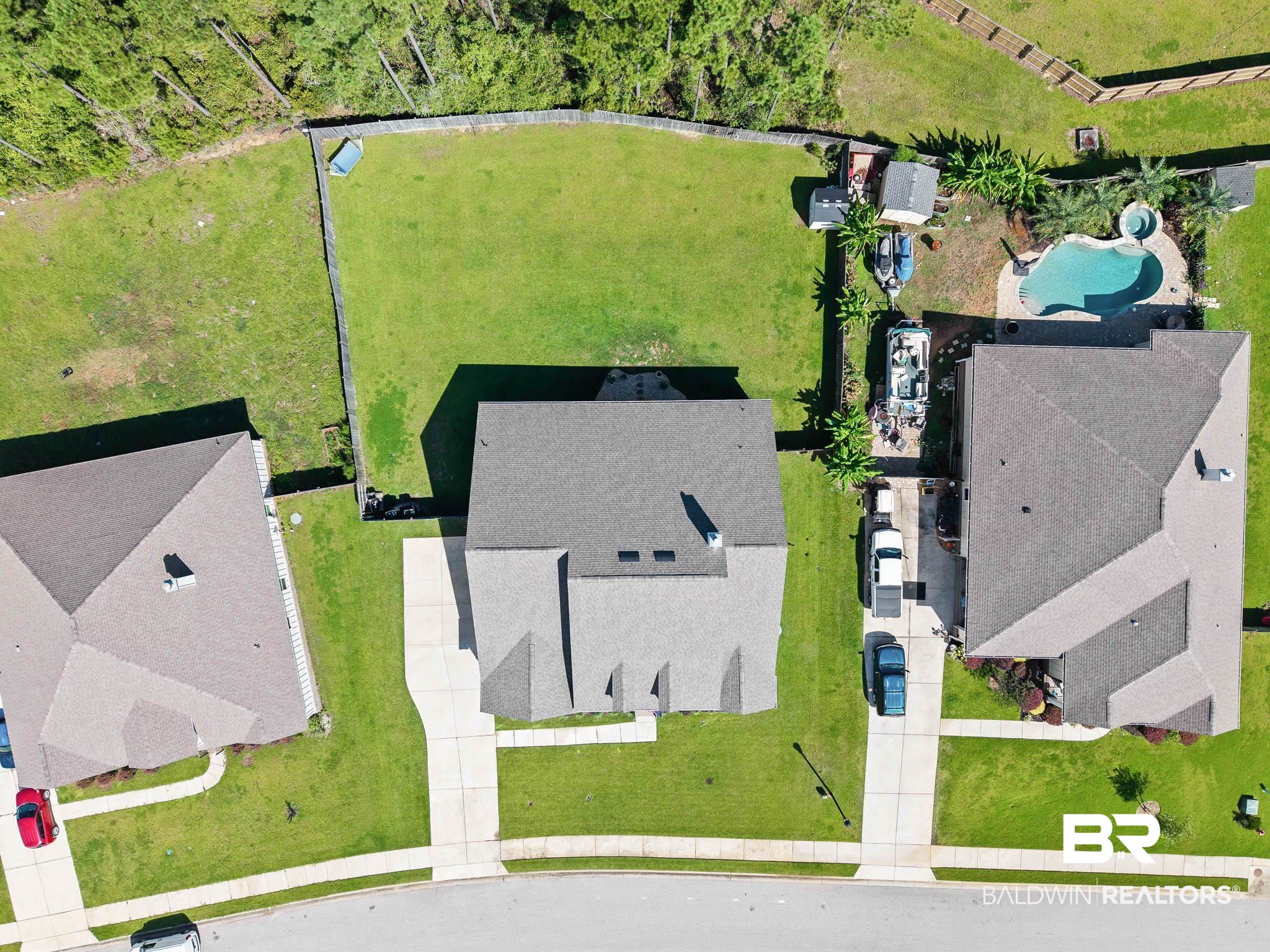 12785 Warbler Street Daphne, AL 36527 - Photo 44 of 53 Aerial view of a pool