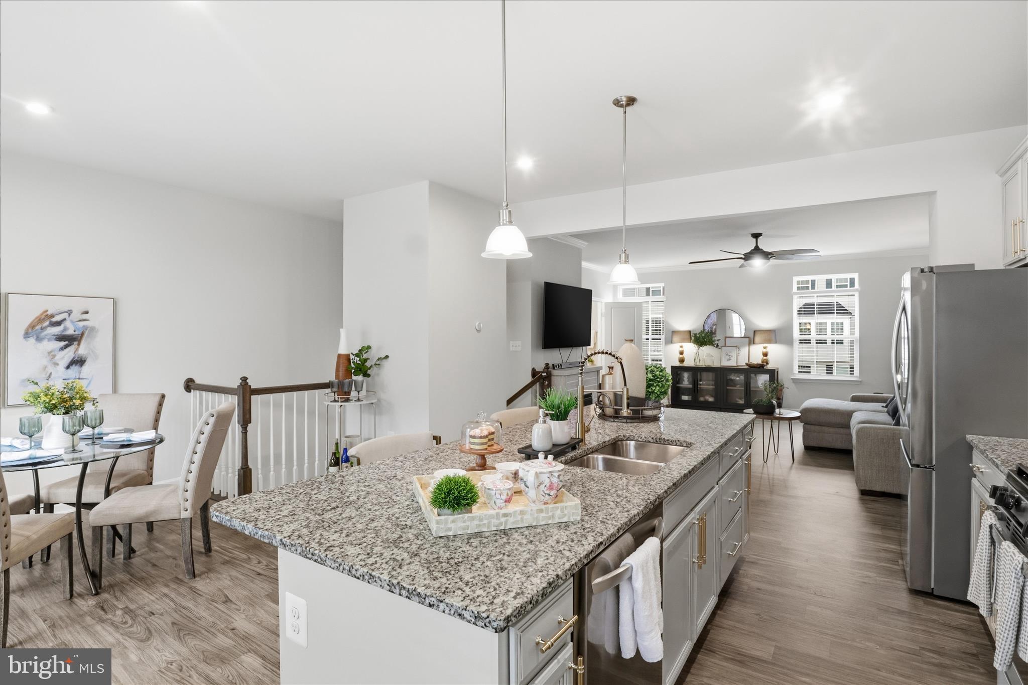 506 View Point Way Fredericksburg, VA 22405 - Photo 13 of 39 a kitchen with stainless steel appliances granite countertop kitchen island wooden cabinets and refrigerator