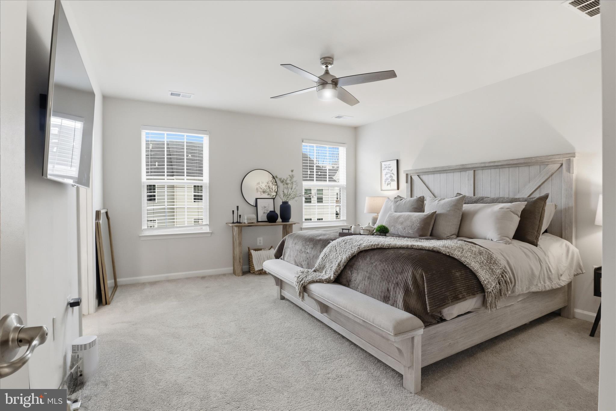 506 View Point Way Fredericksburg, VA 22405 - Photo 17 of 39 a spacious bedroom with a bed and window