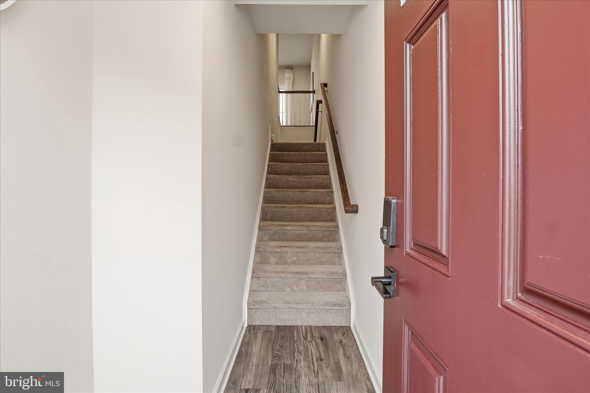 506 View Point Way Fredericksburg, VA 22405 - Photo 4 of 39 a view of a hallway with wooden floor and entryway