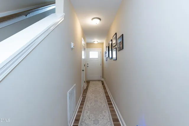 a view of a hallway with entryway