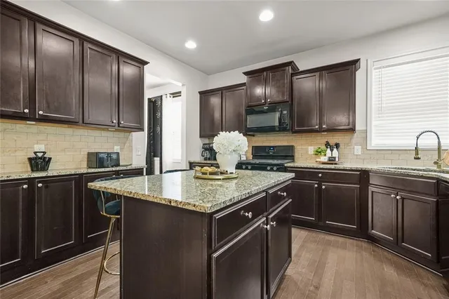 a view of a hallway with windows