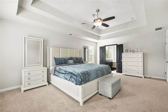 a bathroom with a shower sink and mirror
