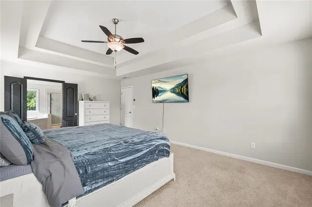 a bathroom with a tub a sink and a shower