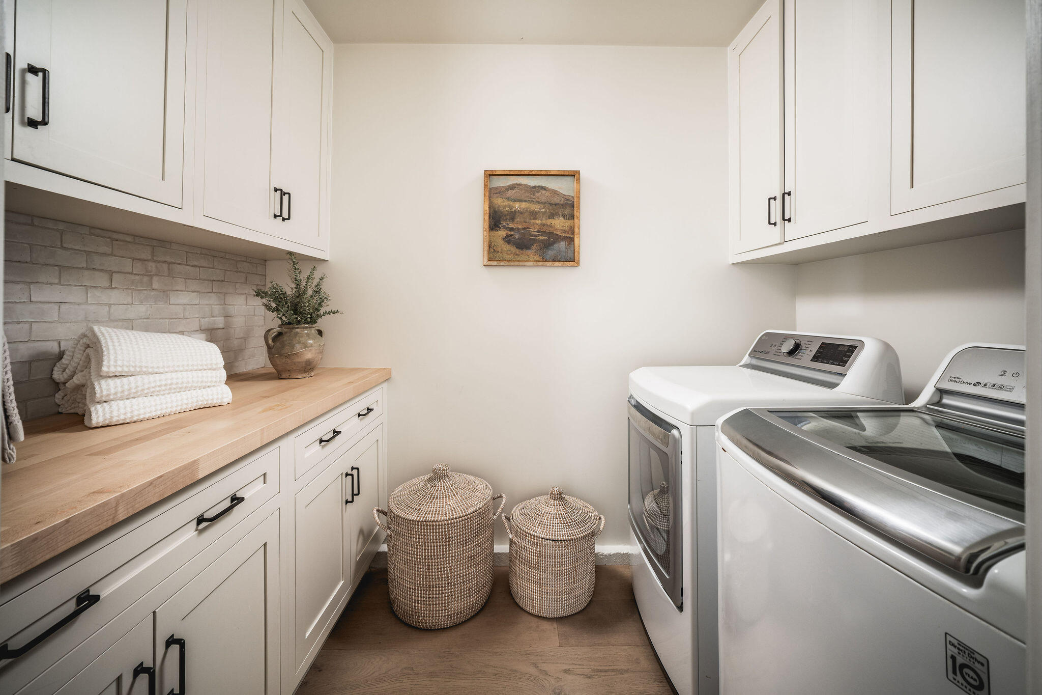 1383 School House Road Santa Barbara, CA 93108 - Photo 10 of 10 a utility room with sink dryer and washer