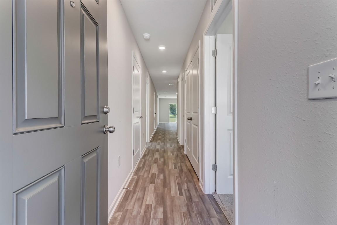 45177 Red Brick Drive Callahan, FL 32011 - Photo 4 of 13 a view of a hallway with wooden floor