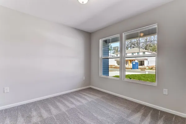 an empty room with window