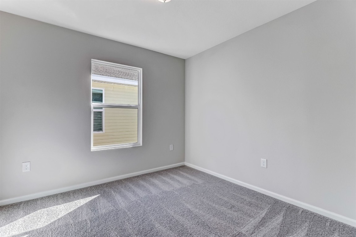 45177 Red Brick Drive Callahan, FL 32011 - Photo 8 of 13 an empty room with a window