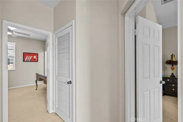 a view of an entryway with a workspace