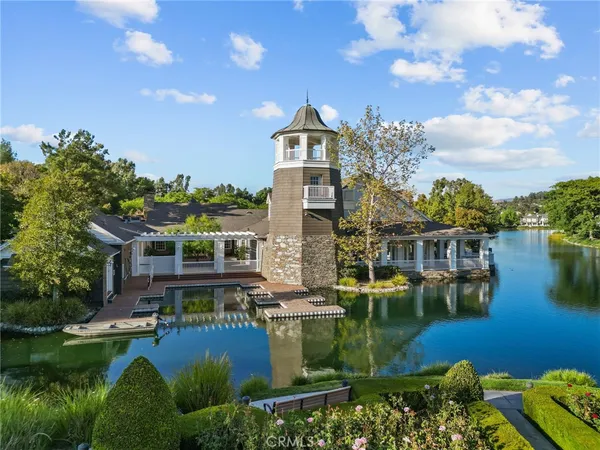 a view of a house with swimming pool and outdoor space