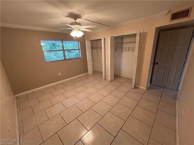 an empty room with closet