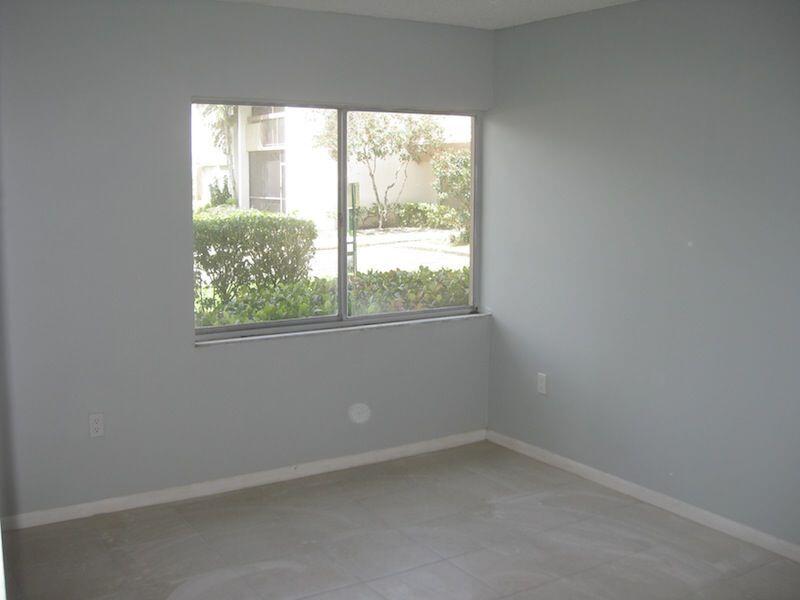 721 North Pine Island Road, Unit 116 Plantation, FL 33324 - Photo 3 of 23 an empty room with a window