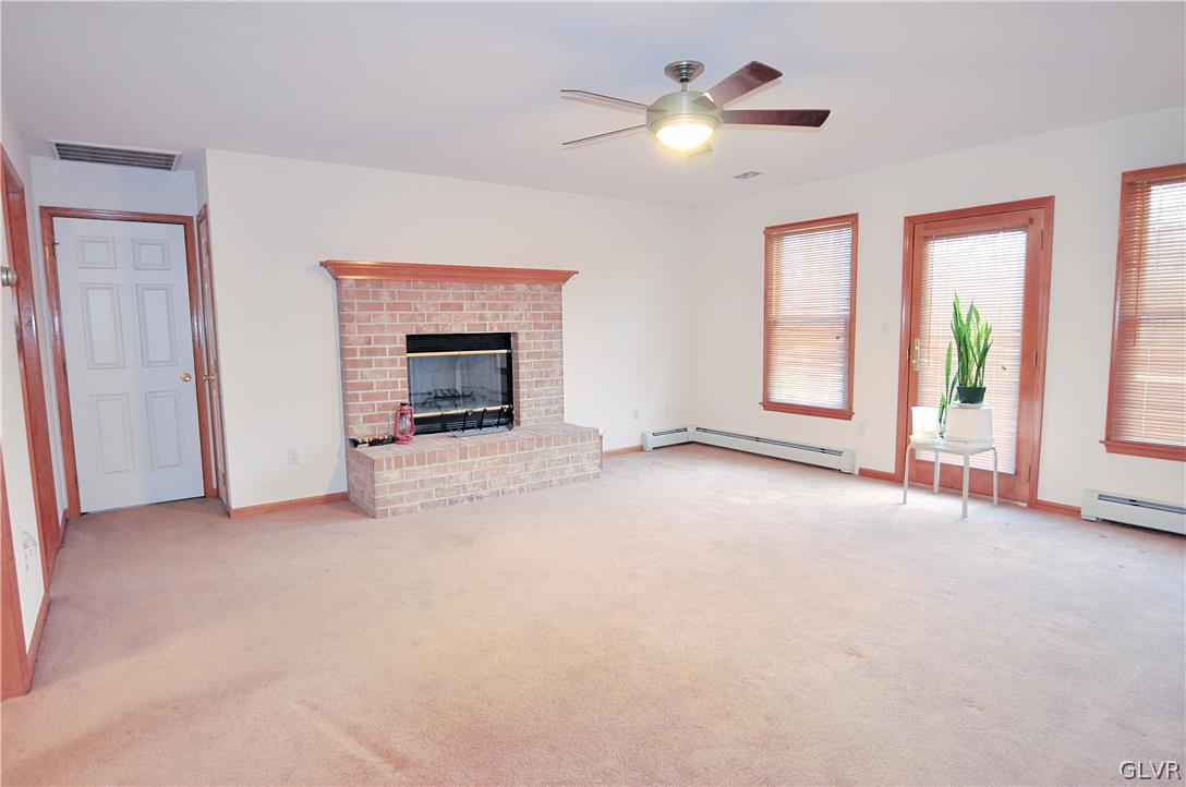 3174 Silver Crest Road Nazareth, PA 18064 - Photo 7 of 37 Living room with wood fireplace