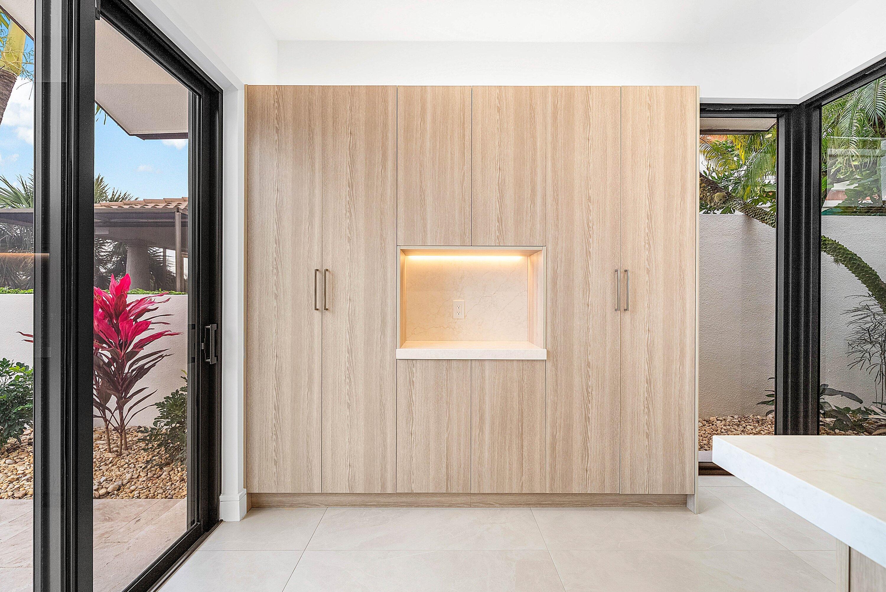 6547 Via Rosa Boca Raton, FL 33433 - Photo 16 of 55 a view of a door and chair in a room