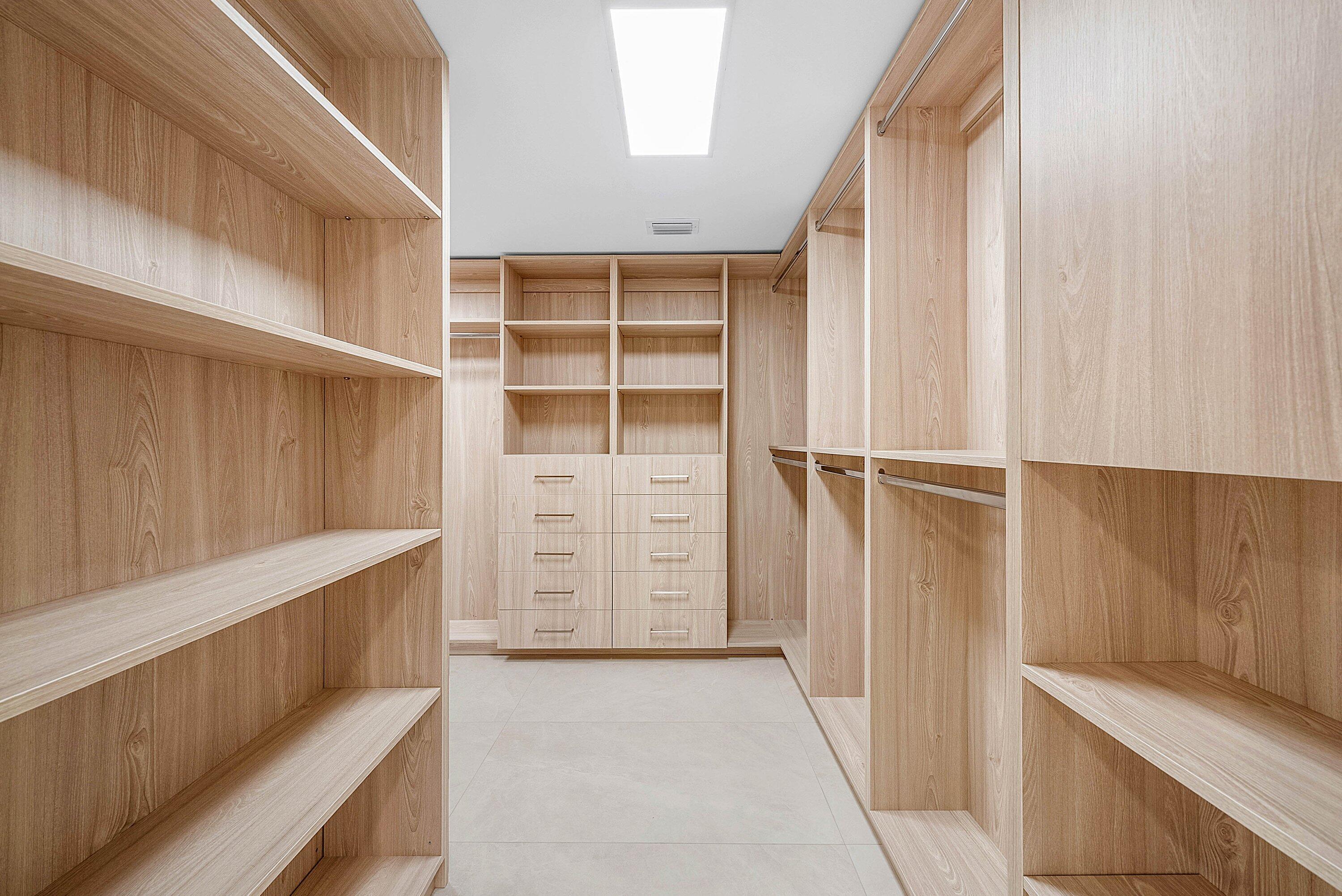 6547 Via Rosa Boca Raton, FL 33433 - Photo 22 of 55 a view of walk in closet with empty racks