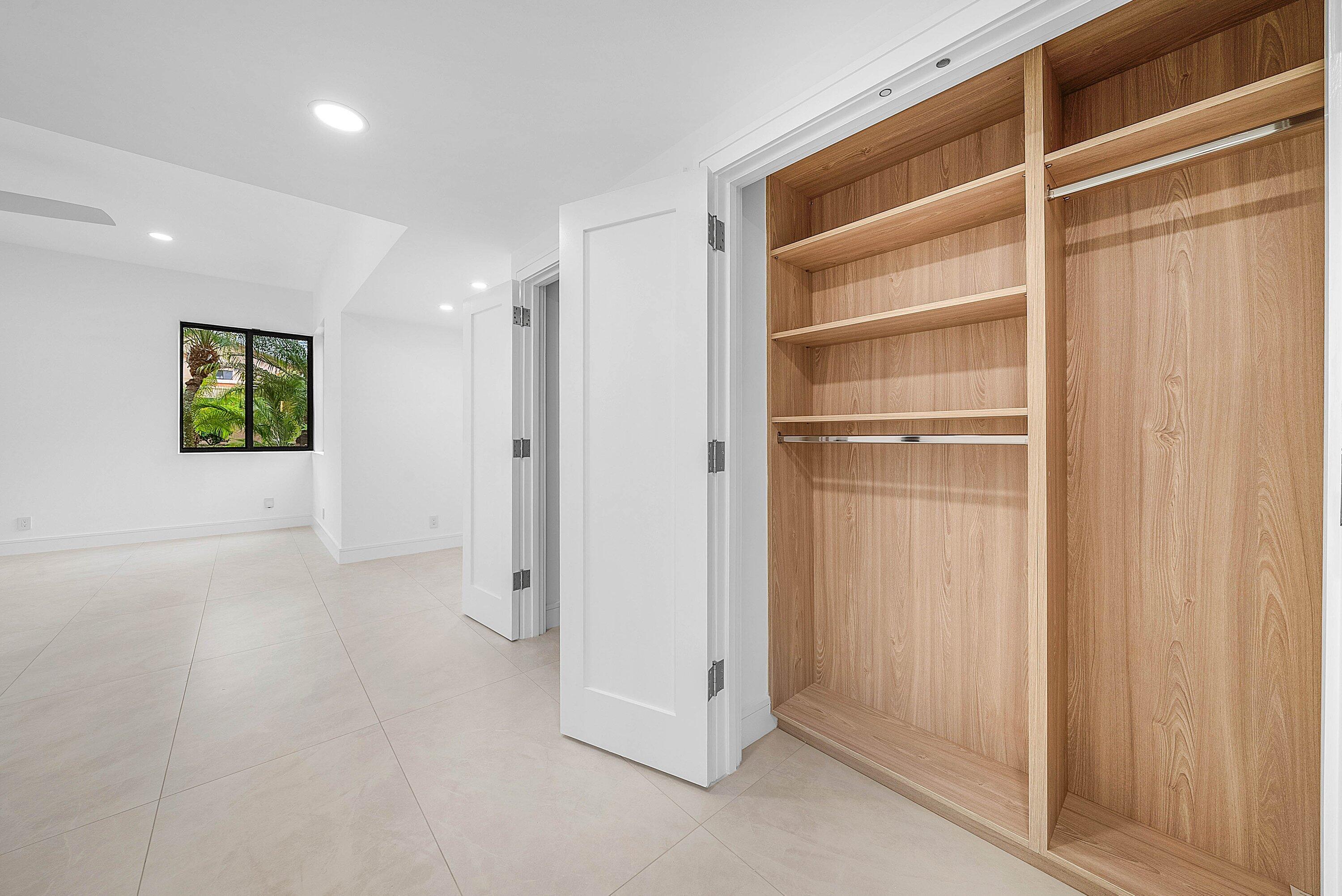 6547 Via Rosa Boca Raton, FL 33433 - Photo 25 of 55 a view of an empty room with a window