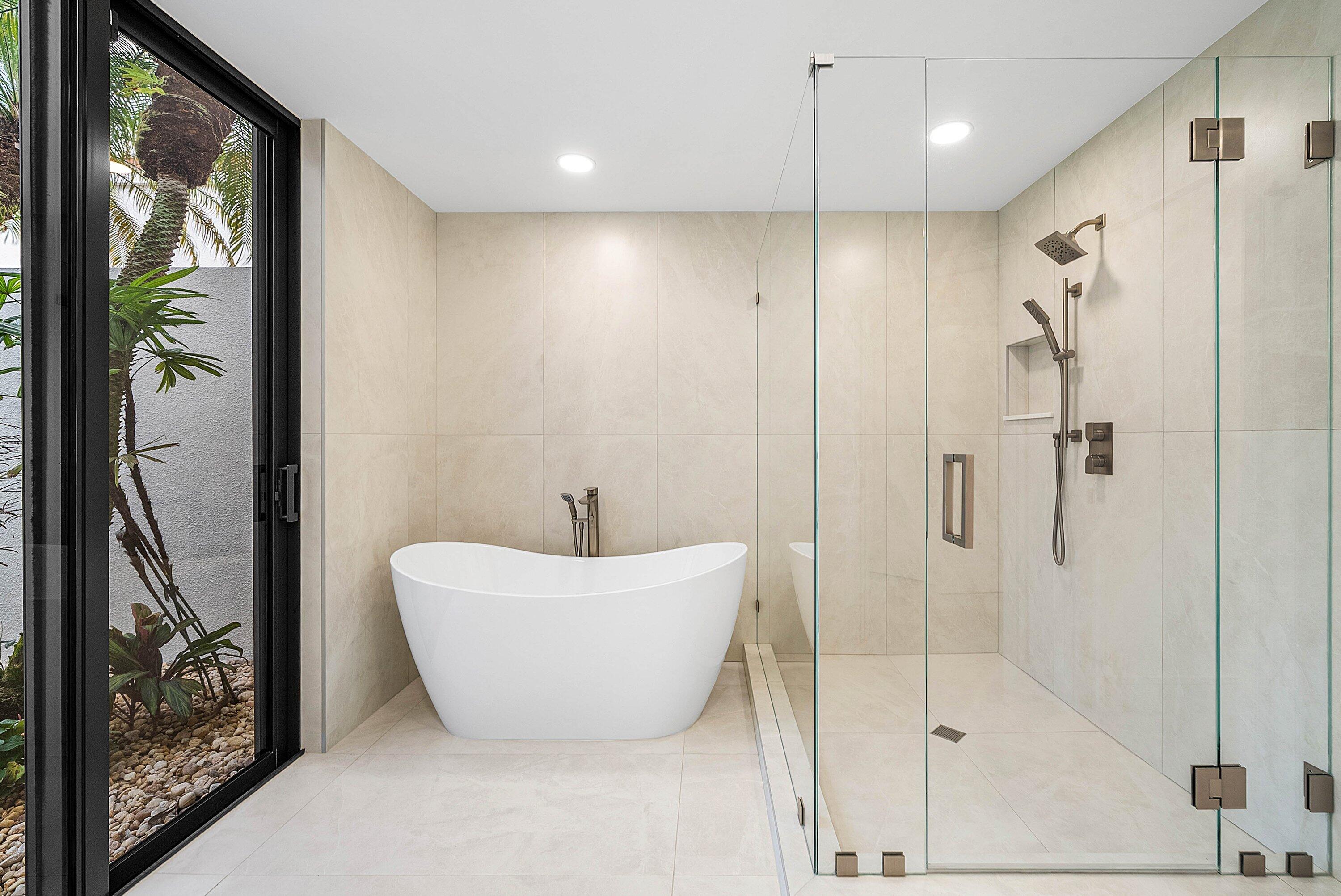 6547 Via Rosa Boca Raton, FL 33433 - Photo 27 of 55 a bathroom with a bathtub and shower