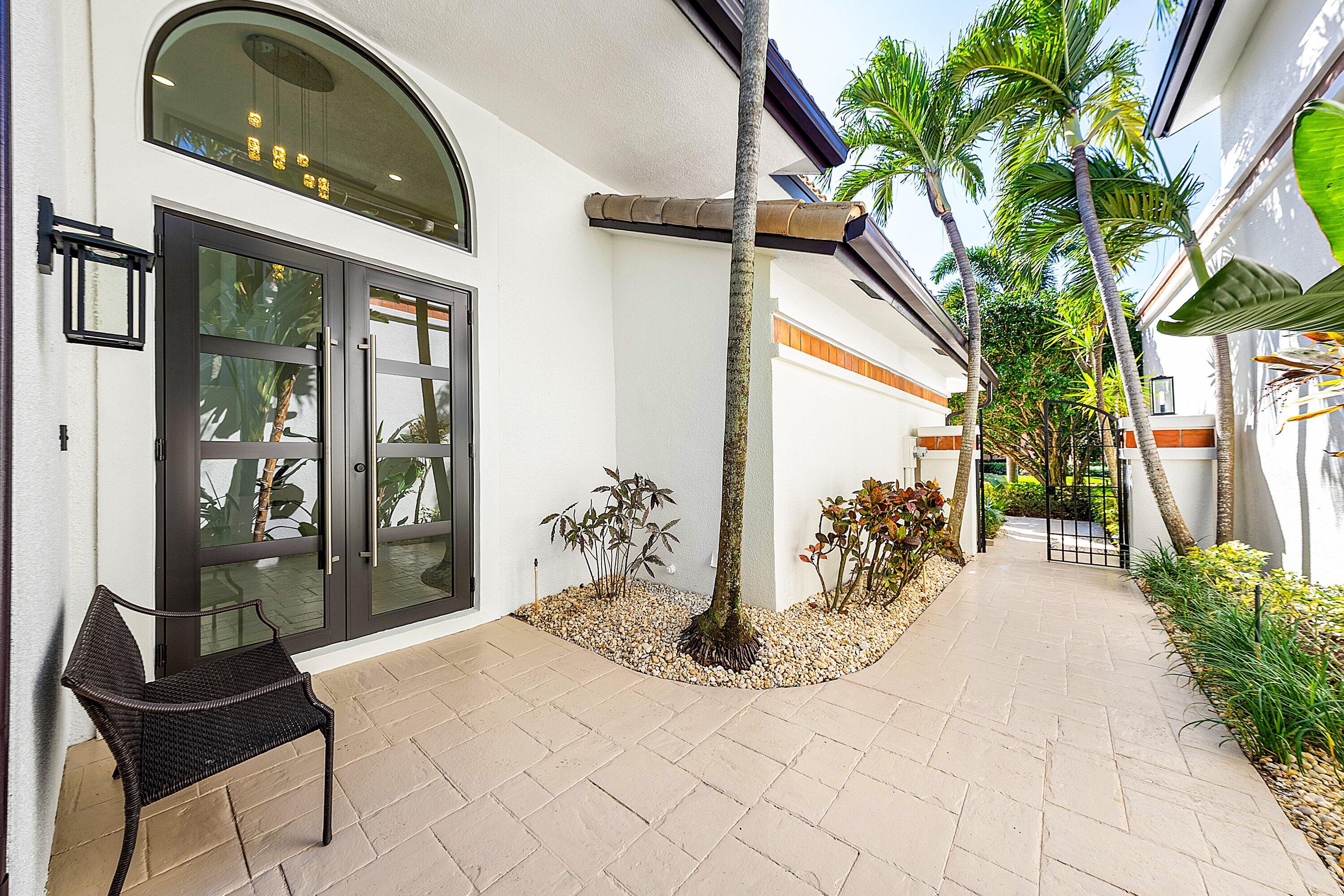 6547 Via Rosa Boca Raton, FL 33433 - Photo 3 of 55 a entryway view with a outdoor space