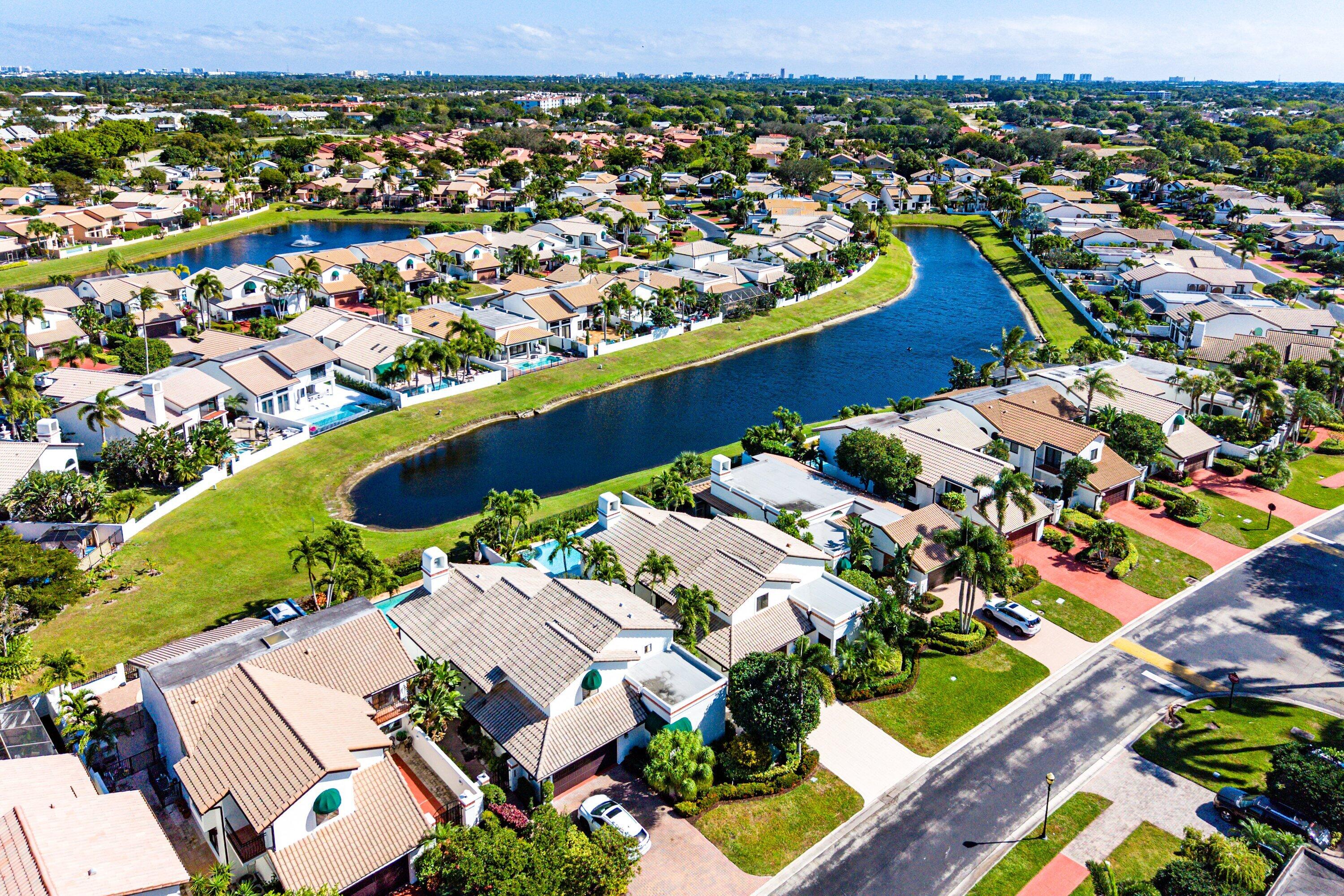 6547 Via Rosa Boca Raton, FL 33433 - Photo 54 of 55 an aerial view of residential houses with outdoor space