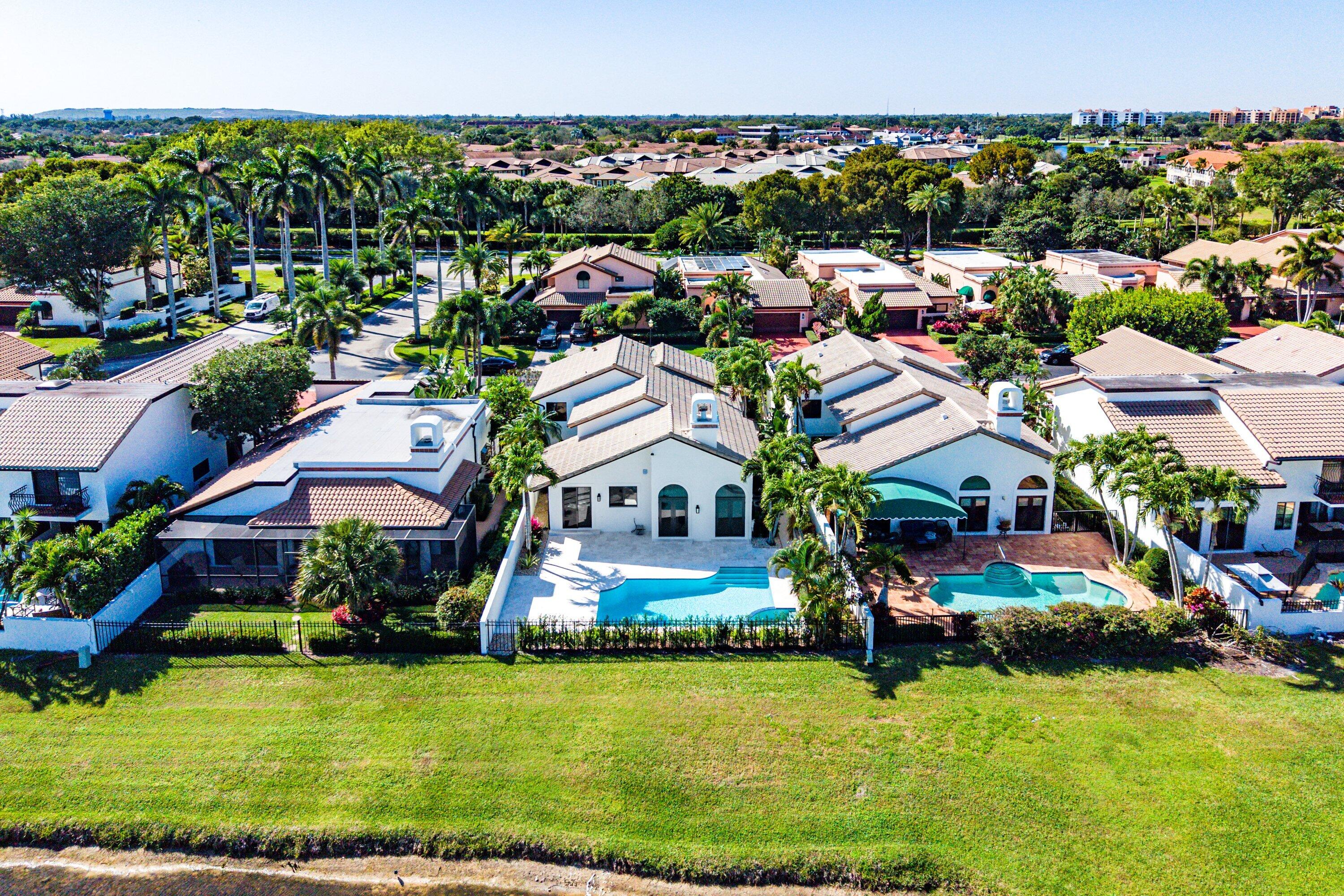 6547 Via Rosa Boca Raton, FL 33433 - Photo 55 of 55 a view of multiple houses with yard