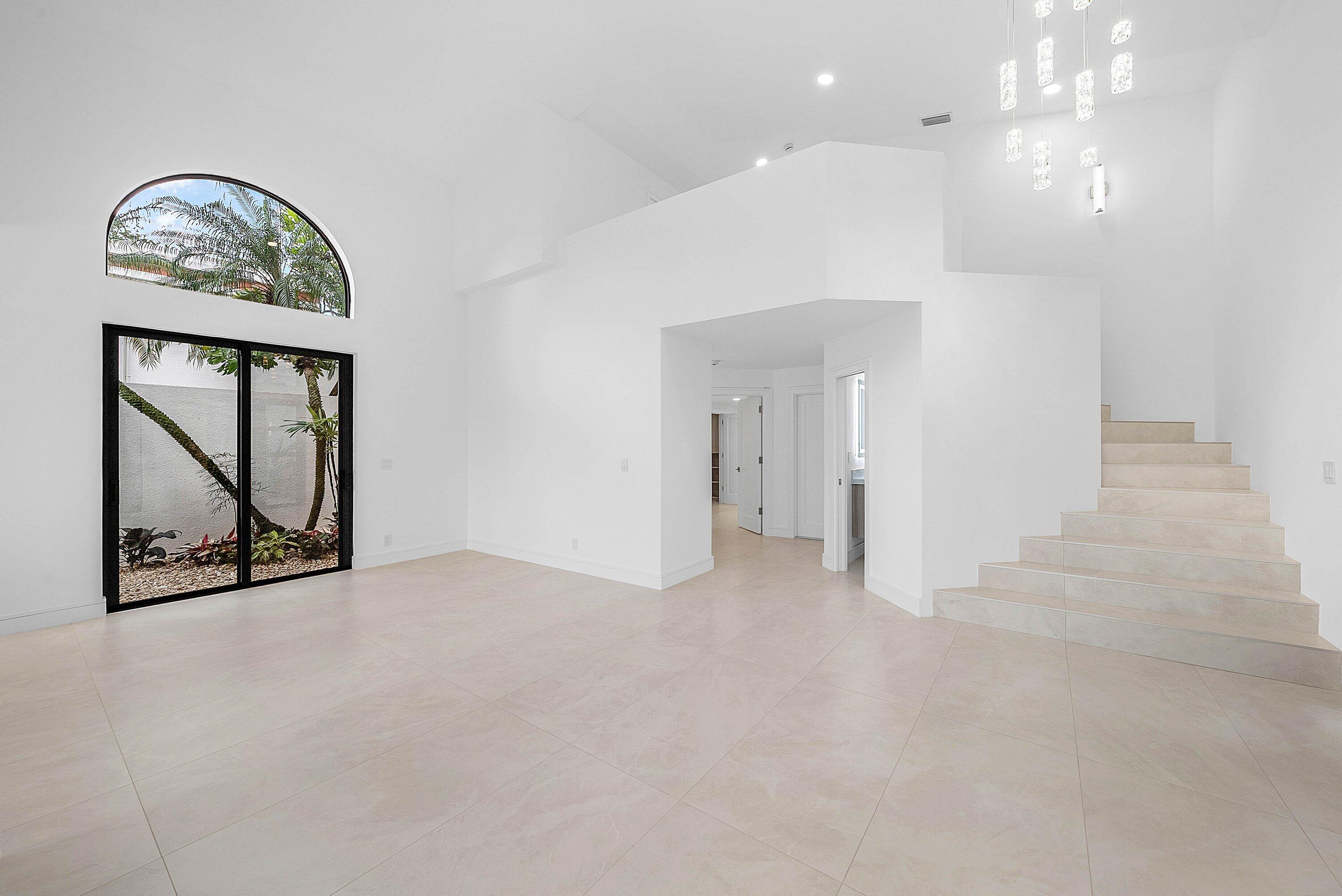 6547 Via Rosa Boca Raton, FL 33433 - Photo 8 of 55 en view interior of a house and an entryway