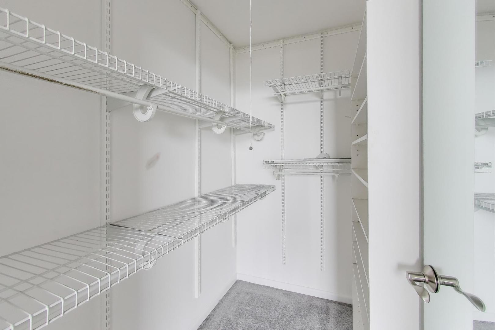 5733 North Sheridan Road, Unit 23B Chicago, IL 60660 - Photo 17 of 33 a view of a kitchen with cabinets
