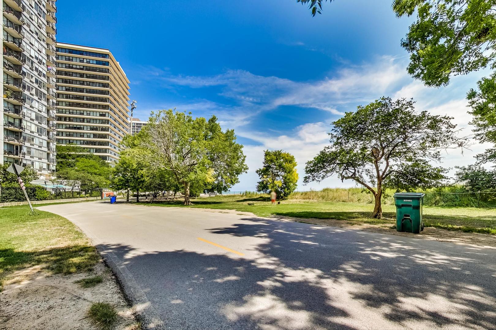 5733 North Sheridan Road, Unit 23B Chicago, IL 60660 - Photo 33 of 33 a view of a street with a building in the background