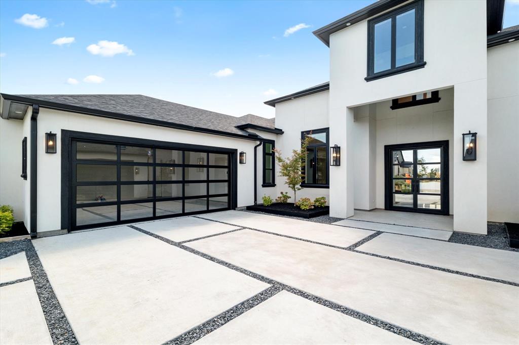 312 Longview Place Heath, TX 75032 - Photo 8 of 40 a front view of a house with garage