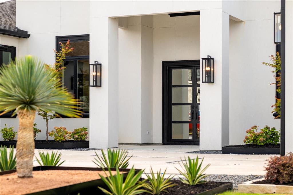 312 Longview Place Heath, TX 75032 - Photo 9 of 40 a view of a entryway door with the view of house