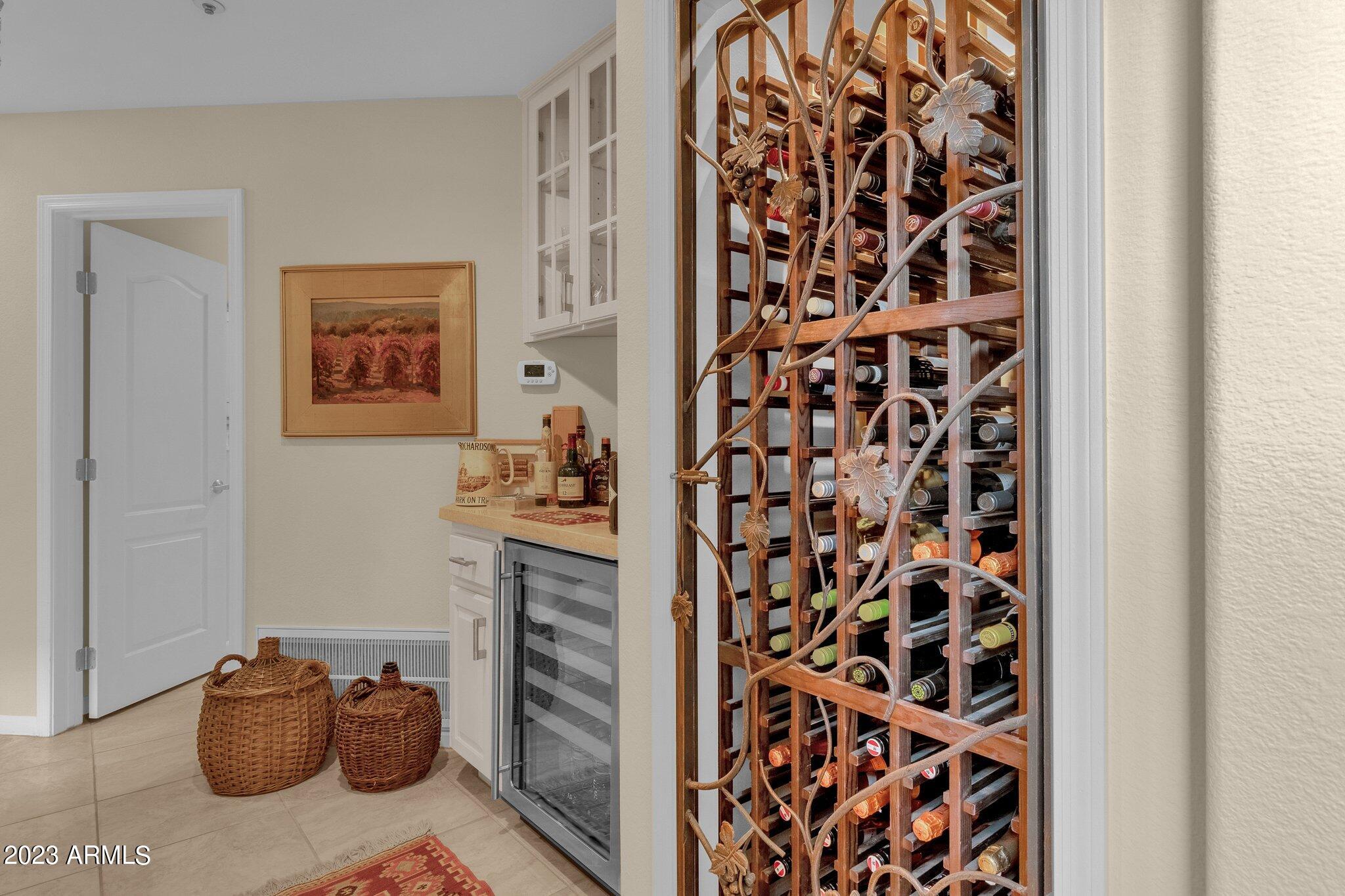7705 East Doubletree Ranch Road, Unit 11 Scottsdale, AZ 85258 - Photo 34 of 58 Wine Fridge & Wine Closet