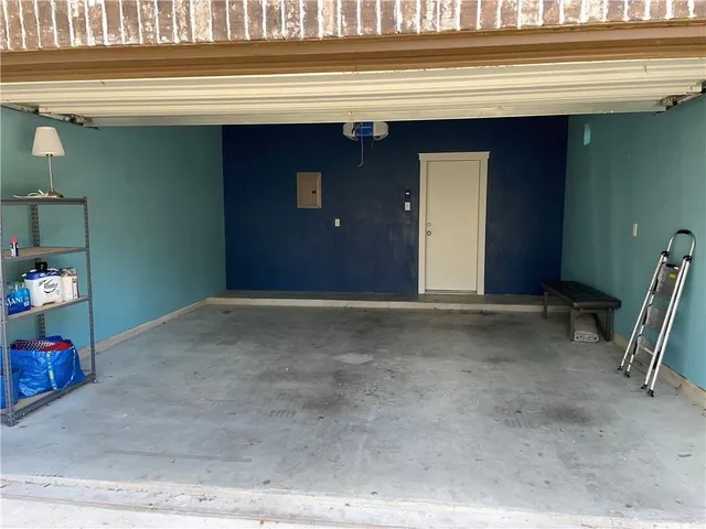 a view of a backyard with sitting area