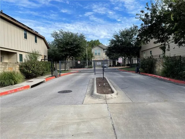 a house with trees in front of it