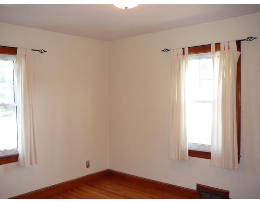 105 Redlands Street Springfield, MA 01104 - Photo 11 of 18 a view of an empty room and window