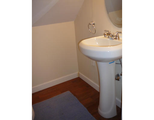 105 Redlands Street Springfield, MA 01104 - Photo 16 of 18 a bathroom with a sink and a mirror
