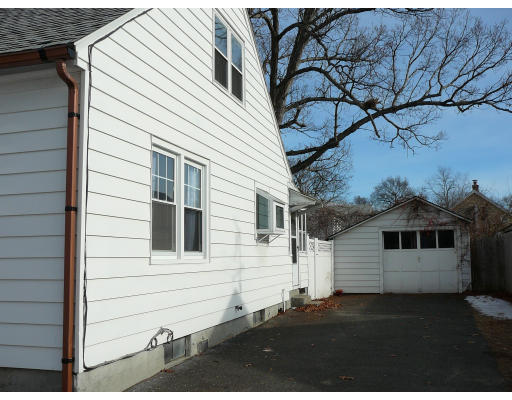 105 Redlands Street Springfield, MA 01104 - Photo 17 of 18 a view of a back yard of the house
