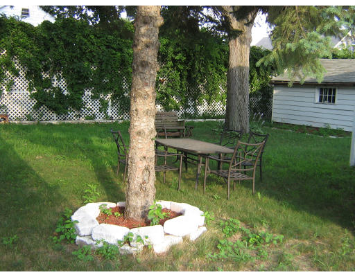 105 Redlands Street Springfield, MA 01104 - Photo 18 of 18 a swimming pool with barbeque oven outdoor seating and yard