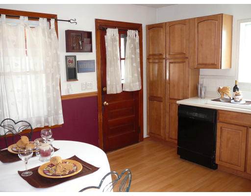 105 Redlands Street Springfield, MA 01104 - Photo 2 of 18 a bed room with a bed and a dresser