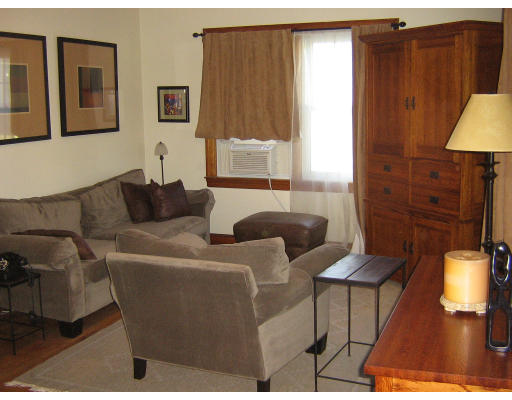 105 Redlands Street Springfield, MA 01104 - Photo 3 of 18 a living room with furniture and a window