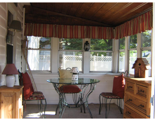 105 Redlands Street Springfield, MA 01104 - Photo 5 of 18 a dining room with furniture and a window