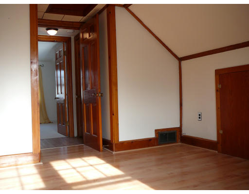 105 Redlands Street Springfield, MA 01104 - Photo 6 of 18 a view of a bathroom with a glass door