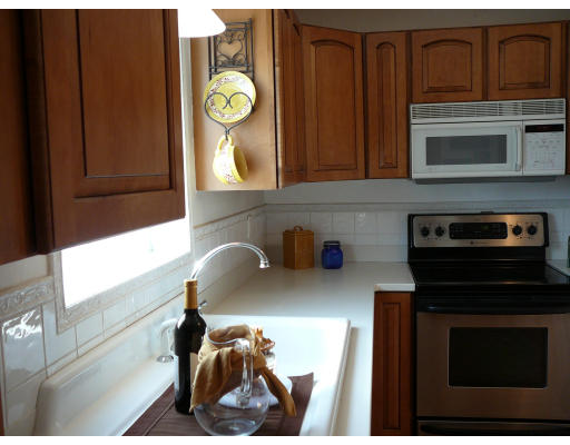 105 Redlands Street Springfield, MA 01104 - Photo 10 of 18 a kitchen with a stove and a microwave