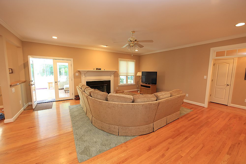 5800 Valley Mist Court Raleigh, NC 27613 - Photo 10 of 30 Hardwood floor, crown molding, Gas fireplace Family Room