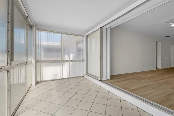 a view of an empty room and window