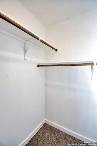 a view of small space with racks on the wall