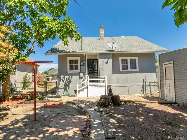 a backyard of a house with lots of green space